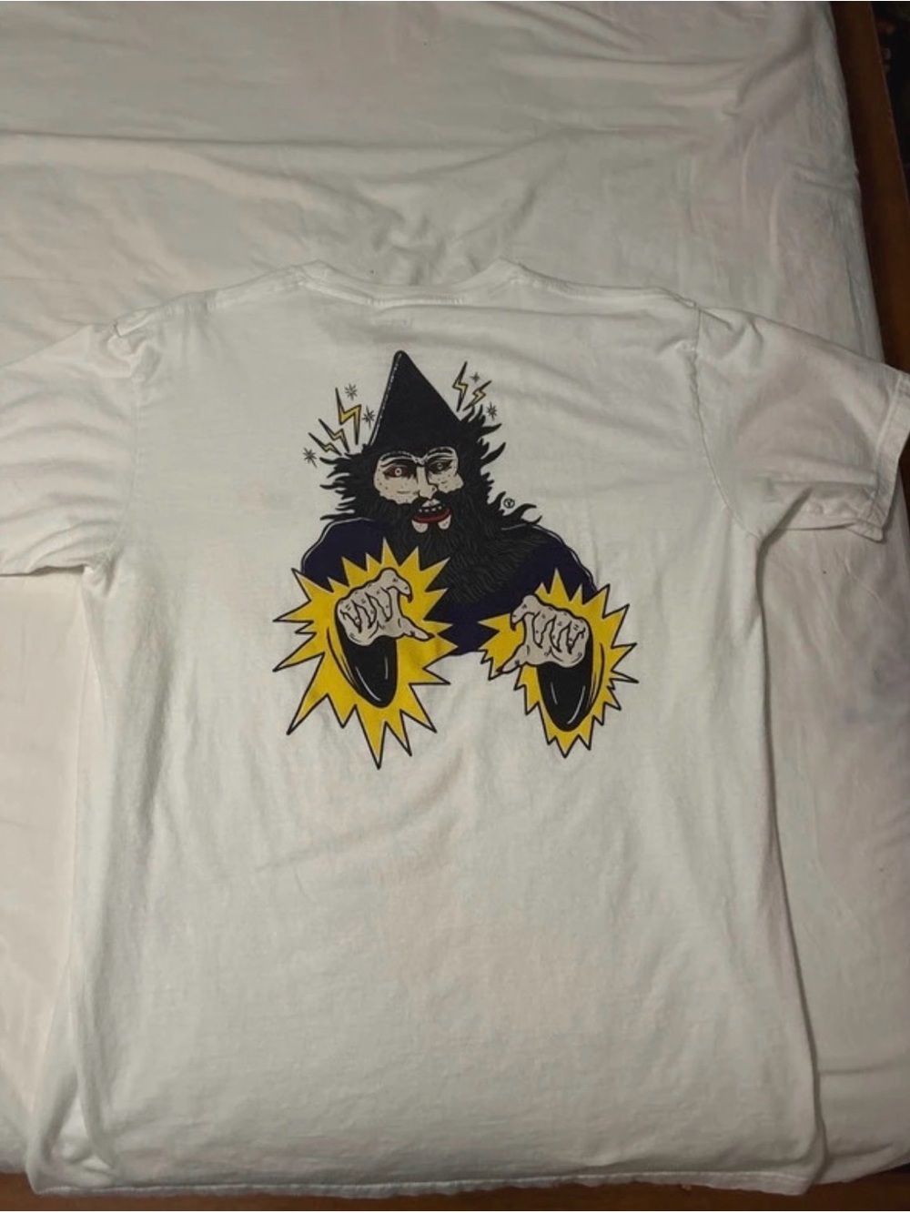 Vans White Short Sleeve Tee with Yellow and Black Wizard Graphic